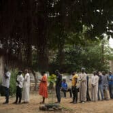 People line up to cast their ballot for legislative elections in Dakar, Senegal.