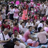 Thousands of people gathered at a park for a gay pride event in Sinagpore.