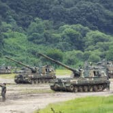 South Korean tanks gather in a field during a military drill.