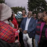 William Ruto greets supporters after voting in Kenya.