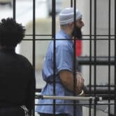 Adnan Syed enters a Baltimore courthouse prior to a hearing.