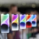 New iPhone 14 models on display at an Apple event in California.