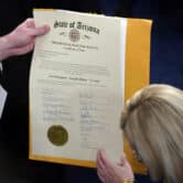 The certification of Arizona Electoral College votes is unsealed at the Capitol, Jan 6, 2021.