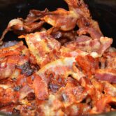 Bacon sizzles on a skillet