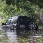 A vehicle is submerged after Hurricane Fiona in Salinas, Puerto Rico.