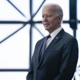 Joe Biden stands during an event at a museum in Boston.
