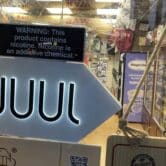 A sign advertising Juul electronic cigarettes