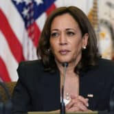 Kamala Harris listens during a meeting at the White House complex.