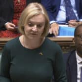 Britain's Liz Truss delivers a speech at Parliament.
