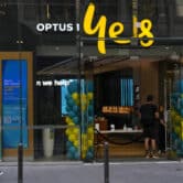 A customer waits for service at an Optus phone store in Sydney, Australia.