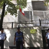 Police guard outside the Iranian Embassy in Tirana, Albania.
