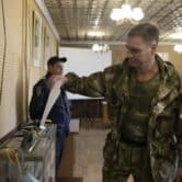 A pro-Russian serviceman votes in eastern Ukraine