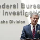 FBI Director Christopher Wray speaks during a news conference in Omaha, Neb.
