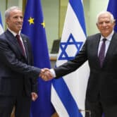 A European Union official meets with an Israeli official in Brussels.