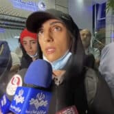 Elnaz Rekabi speaks to journalists in Imam Khomeini International Airport in Iran.