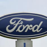 A Ford logo is seen on signage at Country Ford in Graham, N.C.