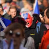 A man shouts as thousands of protesters rally against the Czech government.