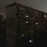 Windows of an apartment building are illuminated during a blackout in Kyiv, Ukraine.