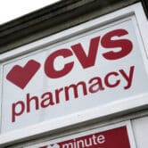 A CVS Pharmacy sign is shown in Mount Lebanon, Pa.