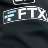The FTX logo appears on an MLB umpire's jacket.