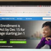 The homepage for healthcare.gov is displayed on a laptop.