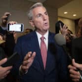 Kevin McCarthy speaks to reporters on Capitol Hill in Washington.