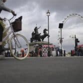 A woman rides a bike in London