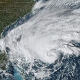 A satellite image showing Tropical Storm Nicole approaching the Bahamas and Florida.