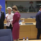 European officials talk during a summit in Brussels.