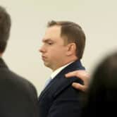 Former Fort Worth police officer Aaron Dean with his defense team