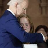 Joe Biden hugs a Sandy Hook survivor during an event in Washington.