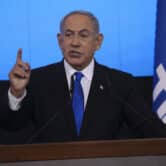 Benjamin Netanyahu speaks to supporters at a party event in Jerusalem.