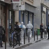 Police investigate the scene of a shootinig in Paris.