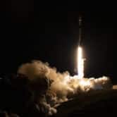 A SpaceX rocket carrying a satellite lifts off in California.