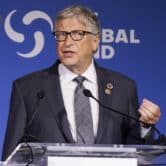 Bill Gates gestures during a speech at an event in New York.