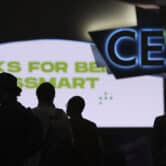Attendees wait for the main show floor to open at the CES tech show.