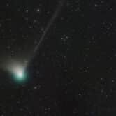 Comet C/2022 E3 (ZTF) is seen in the sky.