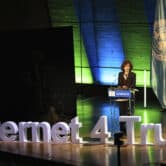 Audrey Azoulay delivers a speech behind blocks that read "Internet 4 Trust."