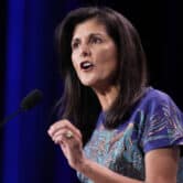 Nikki Haley speaks on stage during an event in Las Vegas.