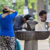 People cool down in a park in Salta, Argentina
