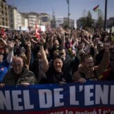 Protesters gather at a demonstration against pension reforms in Marseille, France.