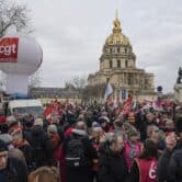 People stage a protest against pension reforms in Paris.