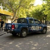 A police truck blocks a street in Argentina.