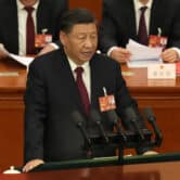 Xi Jinping delivers a speech at China's Great hall of the People.