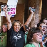 Abortion rights advocates rally in the Nebraska State Capitol.