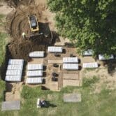 An aerial photo showing a mass grave being refilled at Oaklawn Cemetery in Oklahoma.