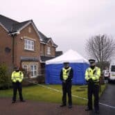 Police Scotland officers stand outside former First Minister Nicola Sturgeon’s home.