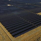 An aerial view of a solar panel farm in Utah.