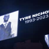 A screen showing a photo of Tyre Nichols with text reading "Tyre Nichols 1993-2023."