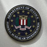 The FBI seal on a wall.